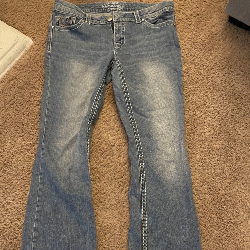 Low rise flared blue jeans